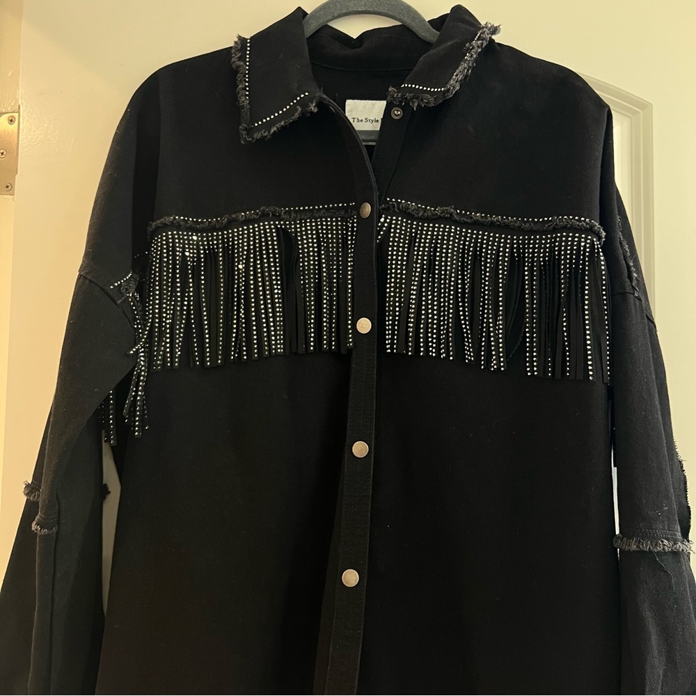 Distressed jean jacket